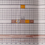 Super Mario Bros Stage Design, 1985 (Unknown author). A zoomed in portion of a level design sheet, focusing on a Kuriboh and a Mushroom block. (Source: Super Mario Bros. 30th Anniversary Special Interview)